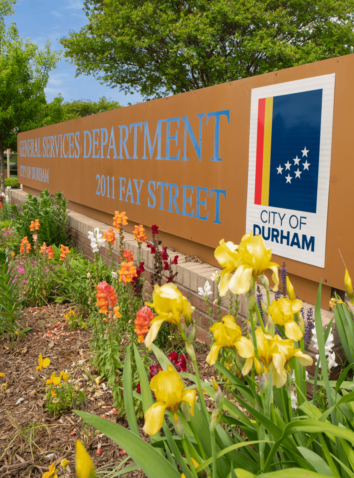 General Services Department sign in garden bed.