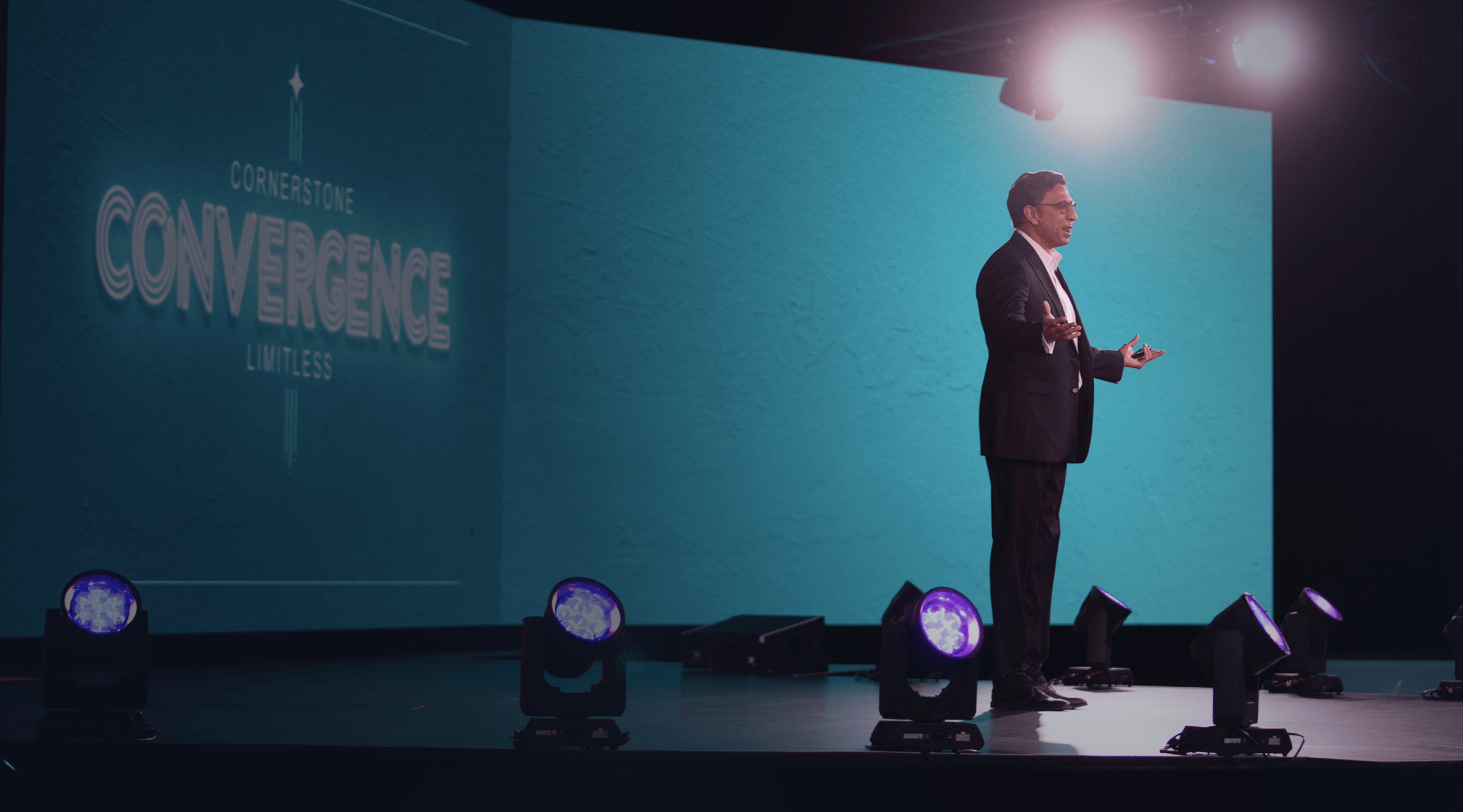 Cornerstone CEO speaking on stage at Cornerstone Convergence