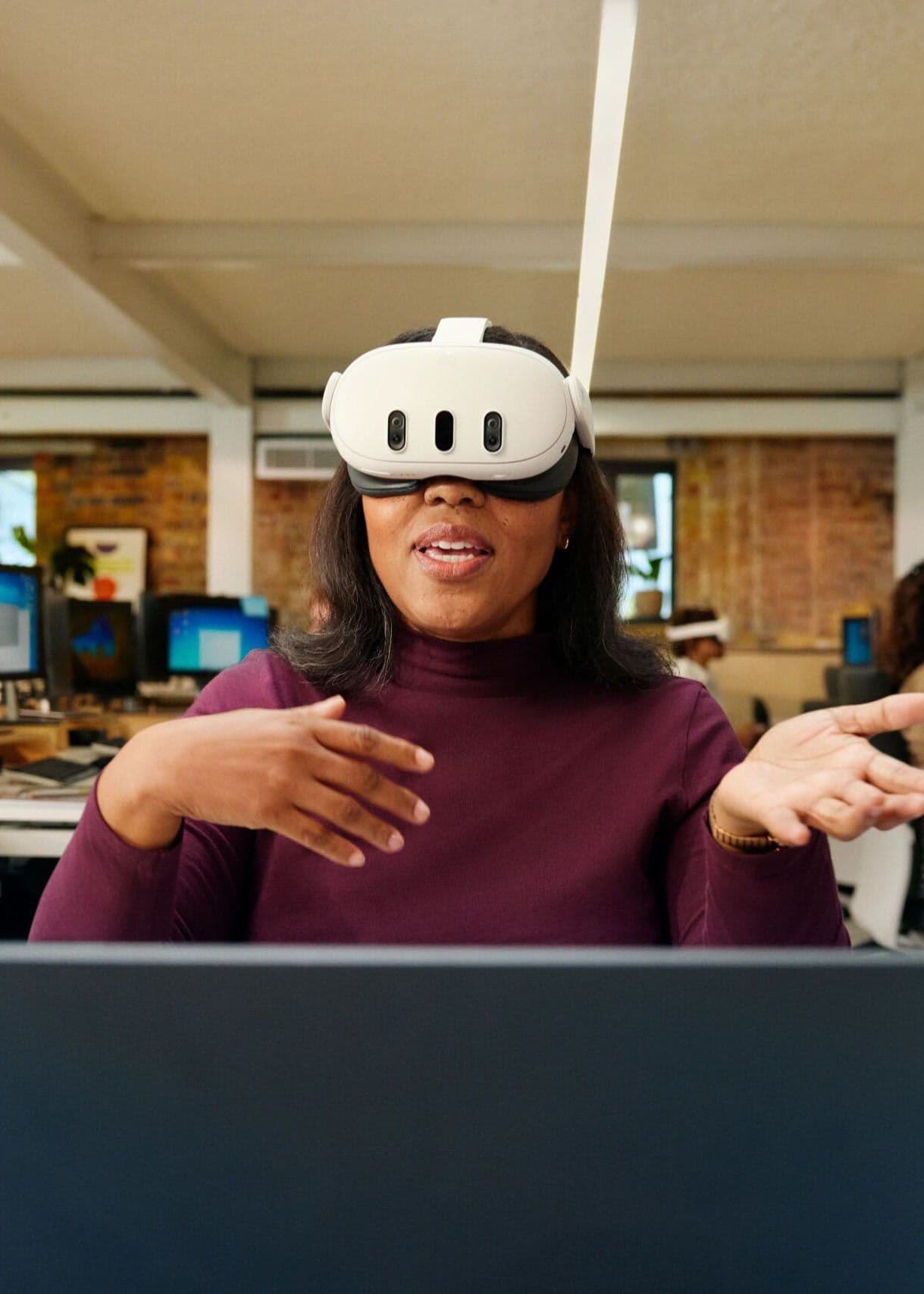 Image of a woman using virtual reality goggles.