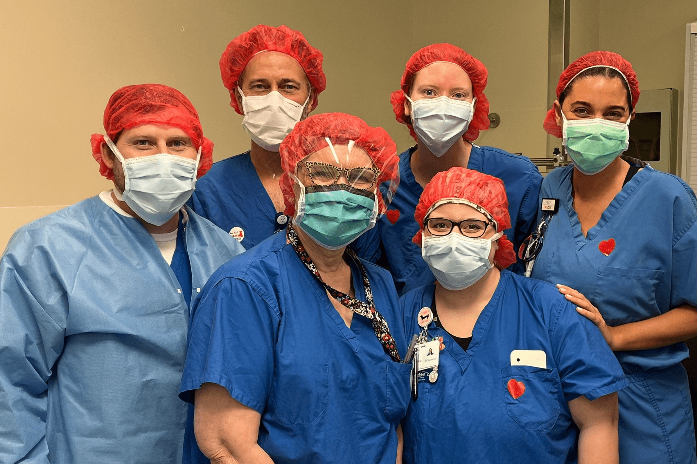 Team of nurses posing for a picture.